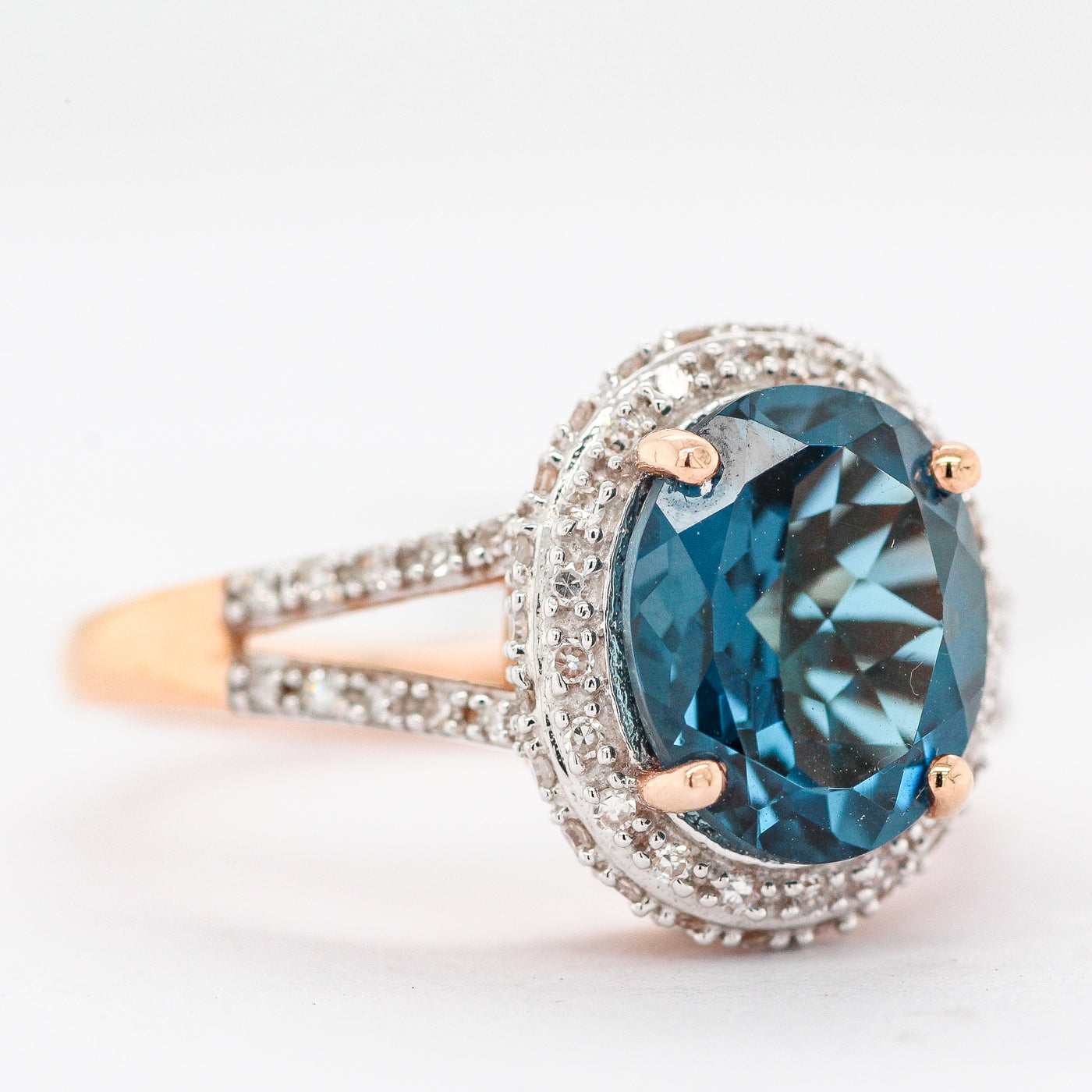 10KR Blue Topaz and Diamond Ring