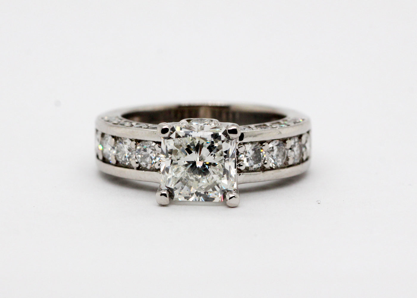 Platinum 3.69 CTTW Diamond engagement ring, 2.09 CT Radiant center, G-