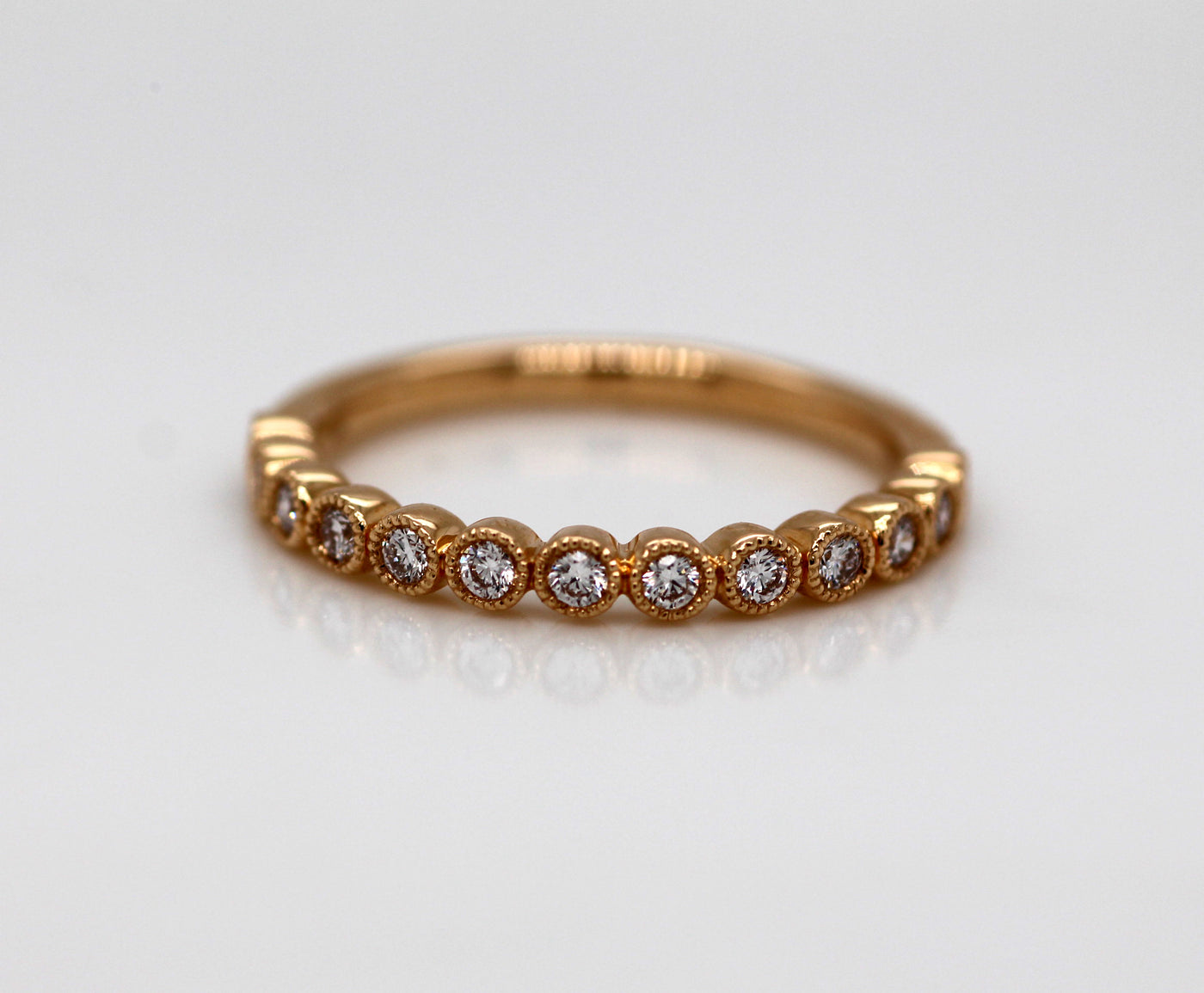 14KY .25 CTTW DIAMOND BEZEL-SET WEDDING BAND