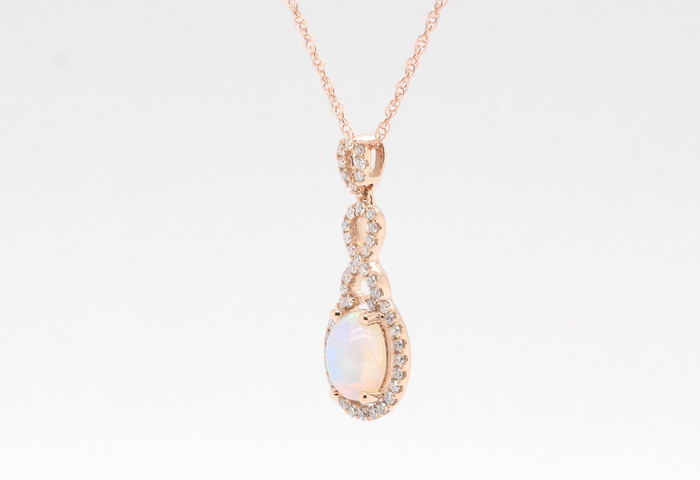 14KR .90 Ct Opal and Diamond Pendant