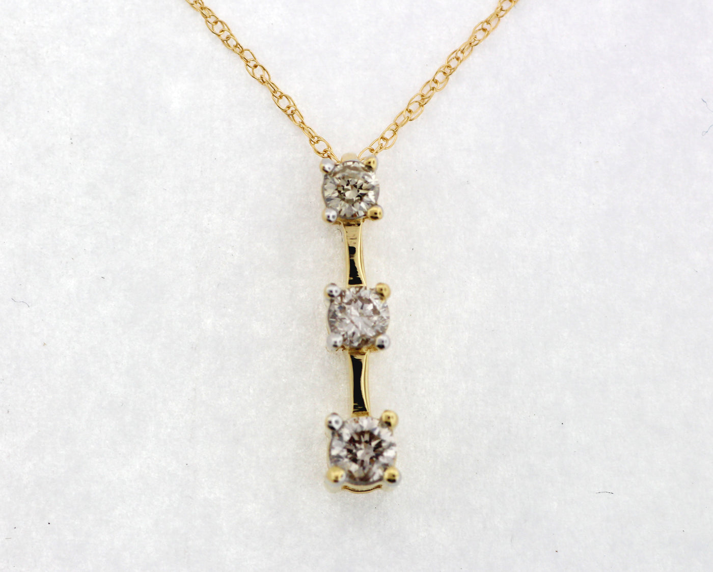 14KY .50 CTTW DIAMOND 3 STONE PENDANT K-SI2