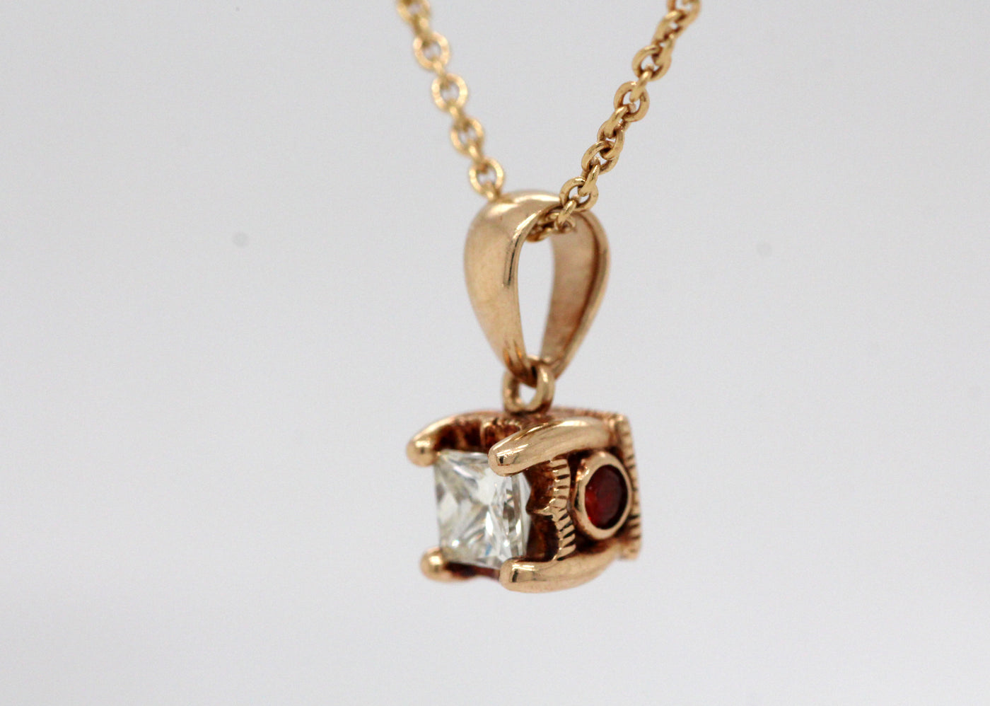 Estate 10KY .28 Ct Princess Cut Diamond and .04 Cttw Ruby Pendant