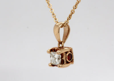 Estate 10KY .28 Ct Princess Cut Diamond and .04 Cttw Ruby Pendant