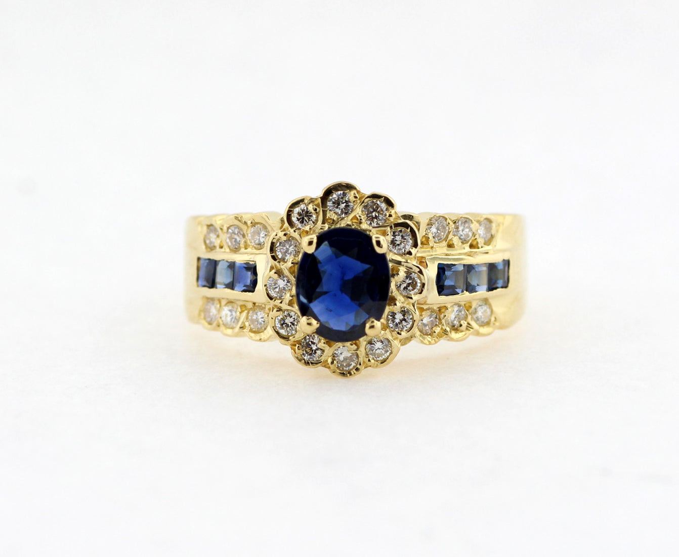 ESTATE 18KY .95 CTTW SAPPHIRE AND DIAMOND RING  .24 CTTW GH-VS2