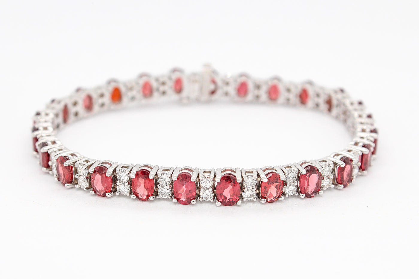 14KW 16.50 CTTW GARNET AND DIAMOND BRACELET, 2.85 CTTW GH-SI2