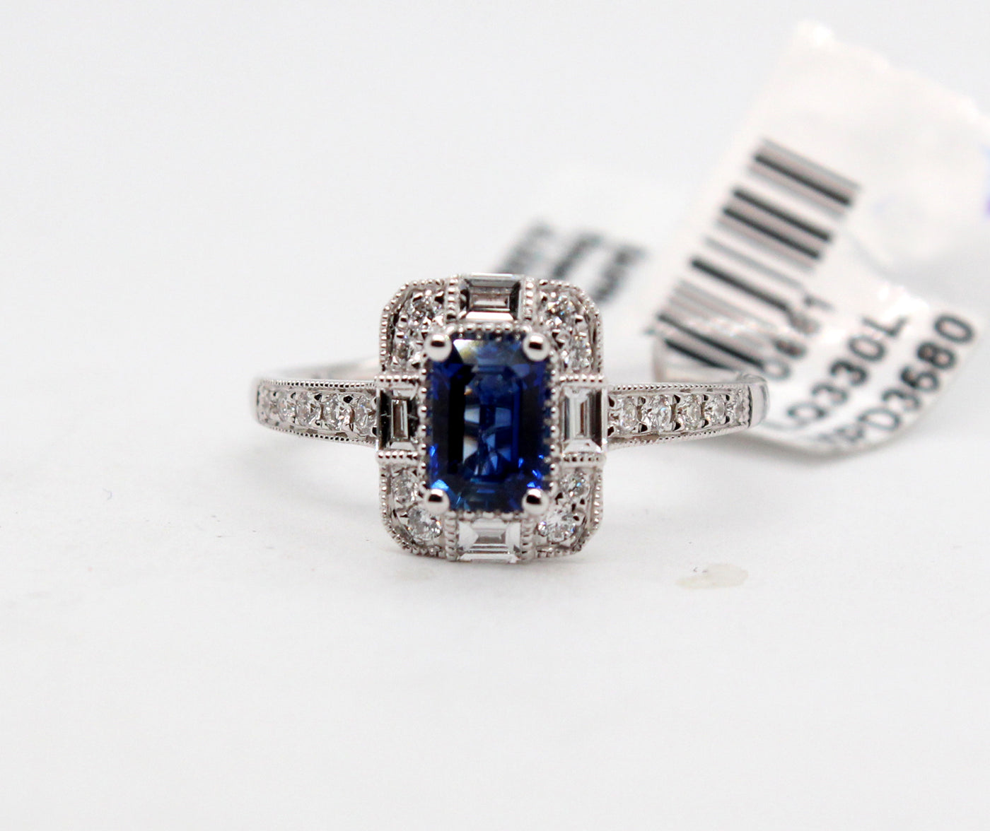 18KW .76 Ct Sapphire and .34 Cttw Diamond Ring