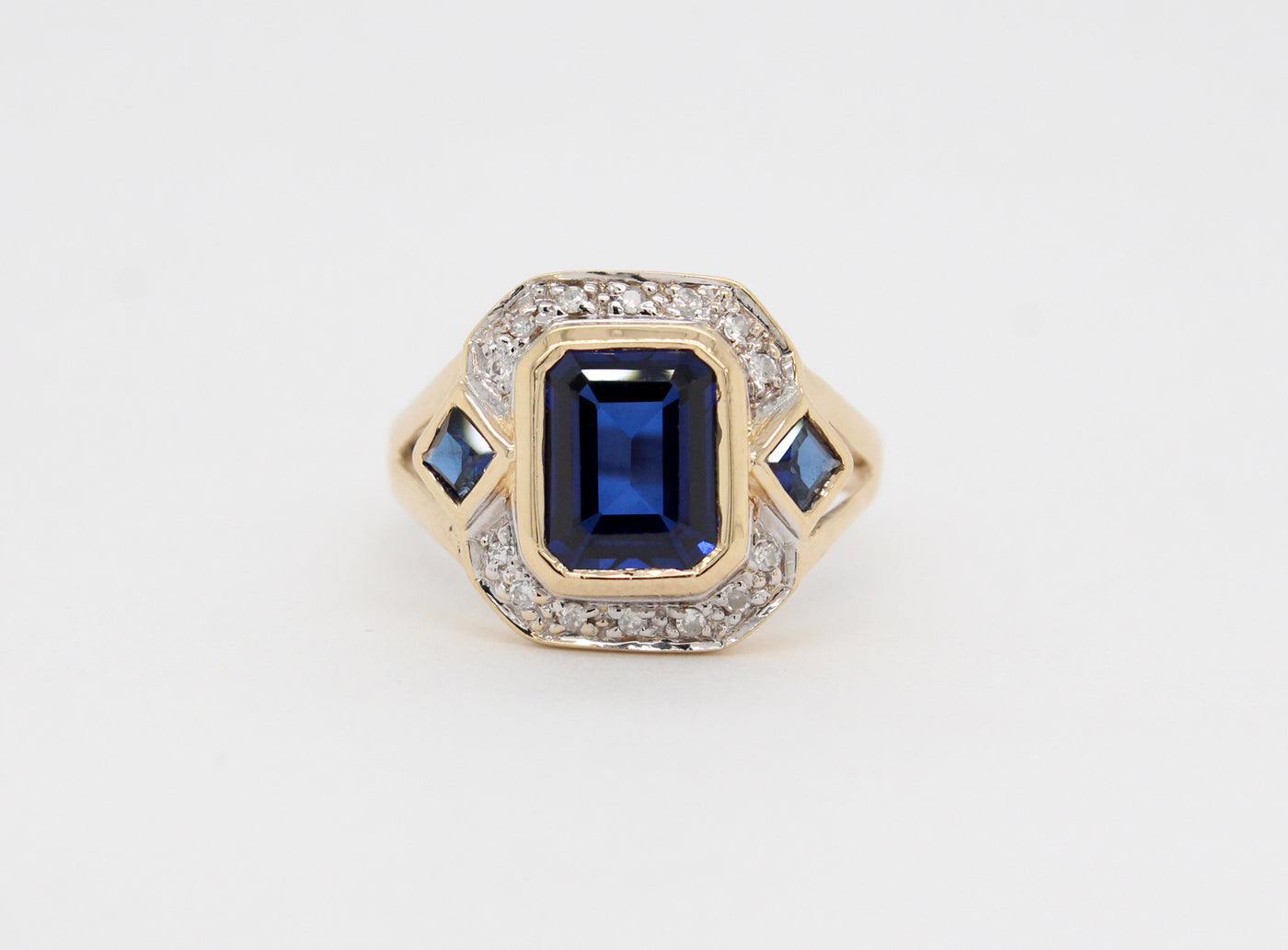 Estate 14KY 2.69 Cttw Synthetic Sapphire and .12 Cttw Diamond Ring