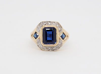 Estate 14KY 2.69 Cttw Synthetic Sapphire and .12 Cttw Diamond Ring