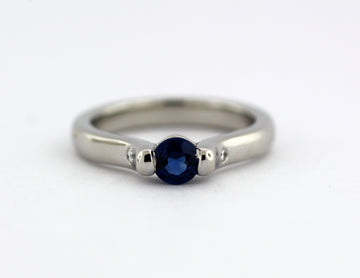 ESTATE PLATINUM .32 CT SAPPHIRE AND DIAMOND RING .02 CTTW
