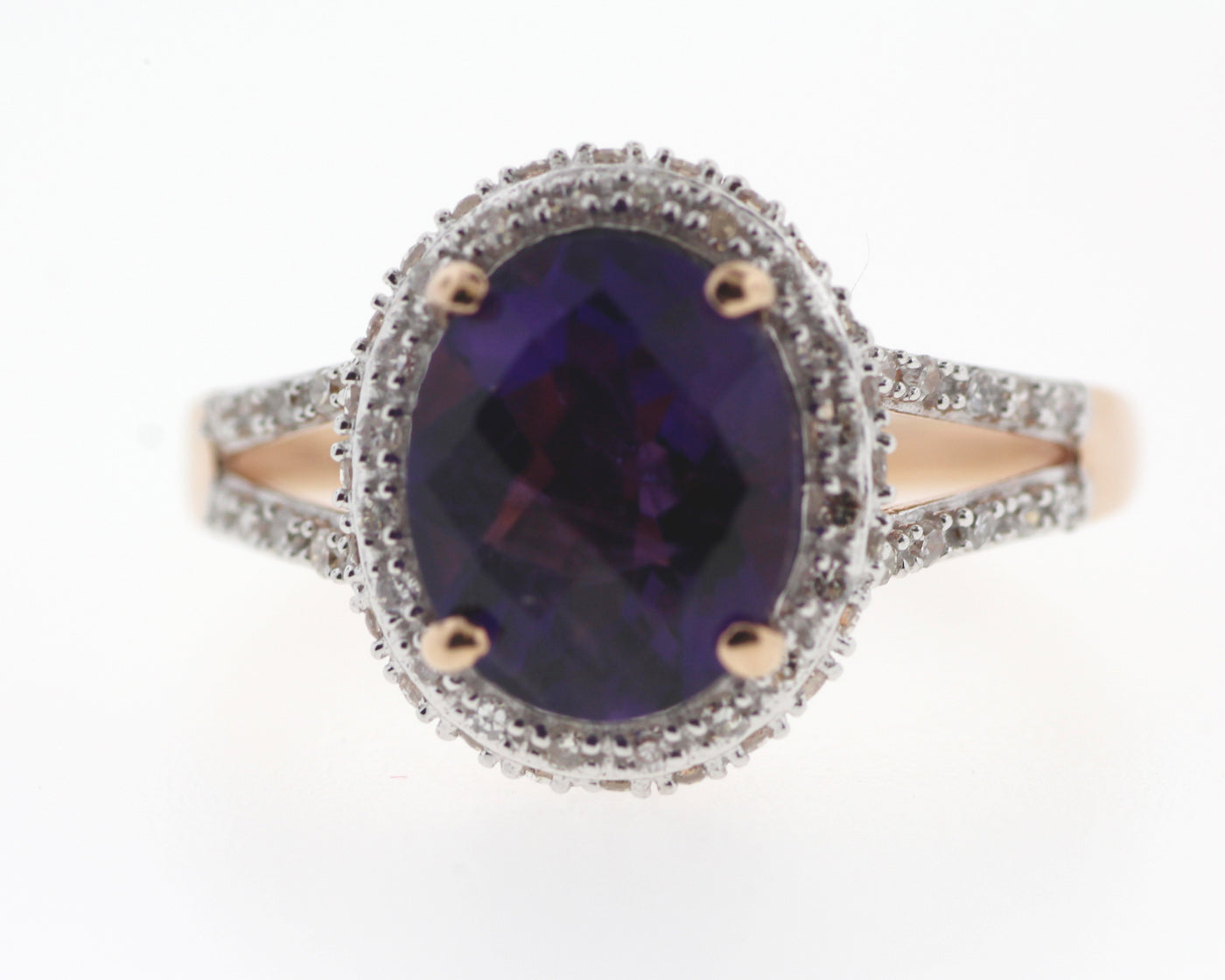10KR AMETHYST AND DIAMOND RING .26CTTW