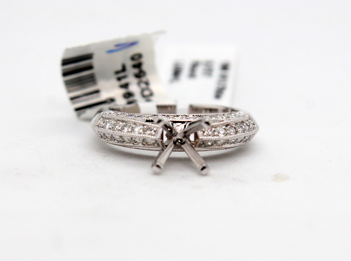 18KW .70 Cttw Diamond Ring