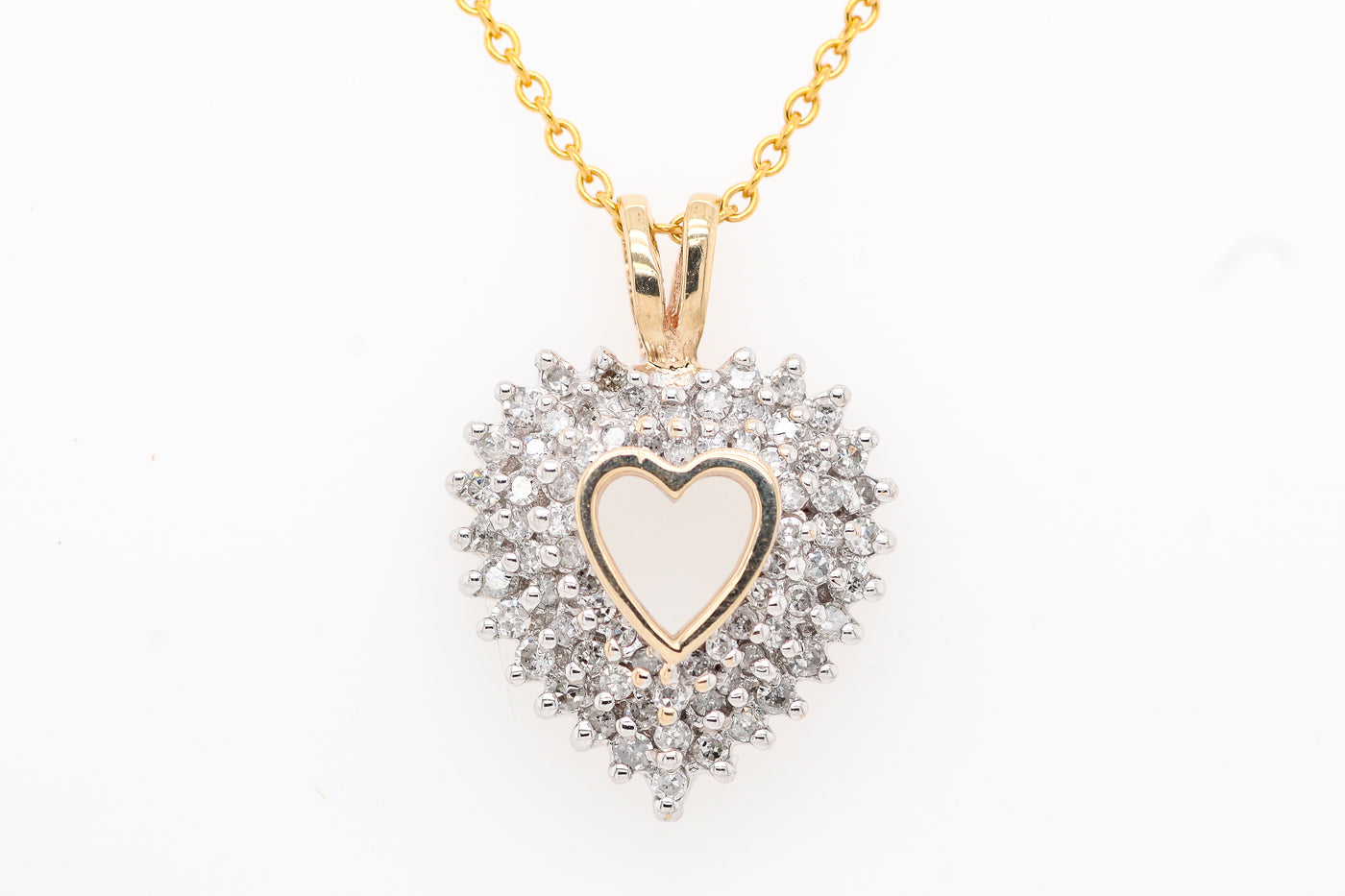 Estate 10ky .51 cttw diamond heart pendant, hi-i1