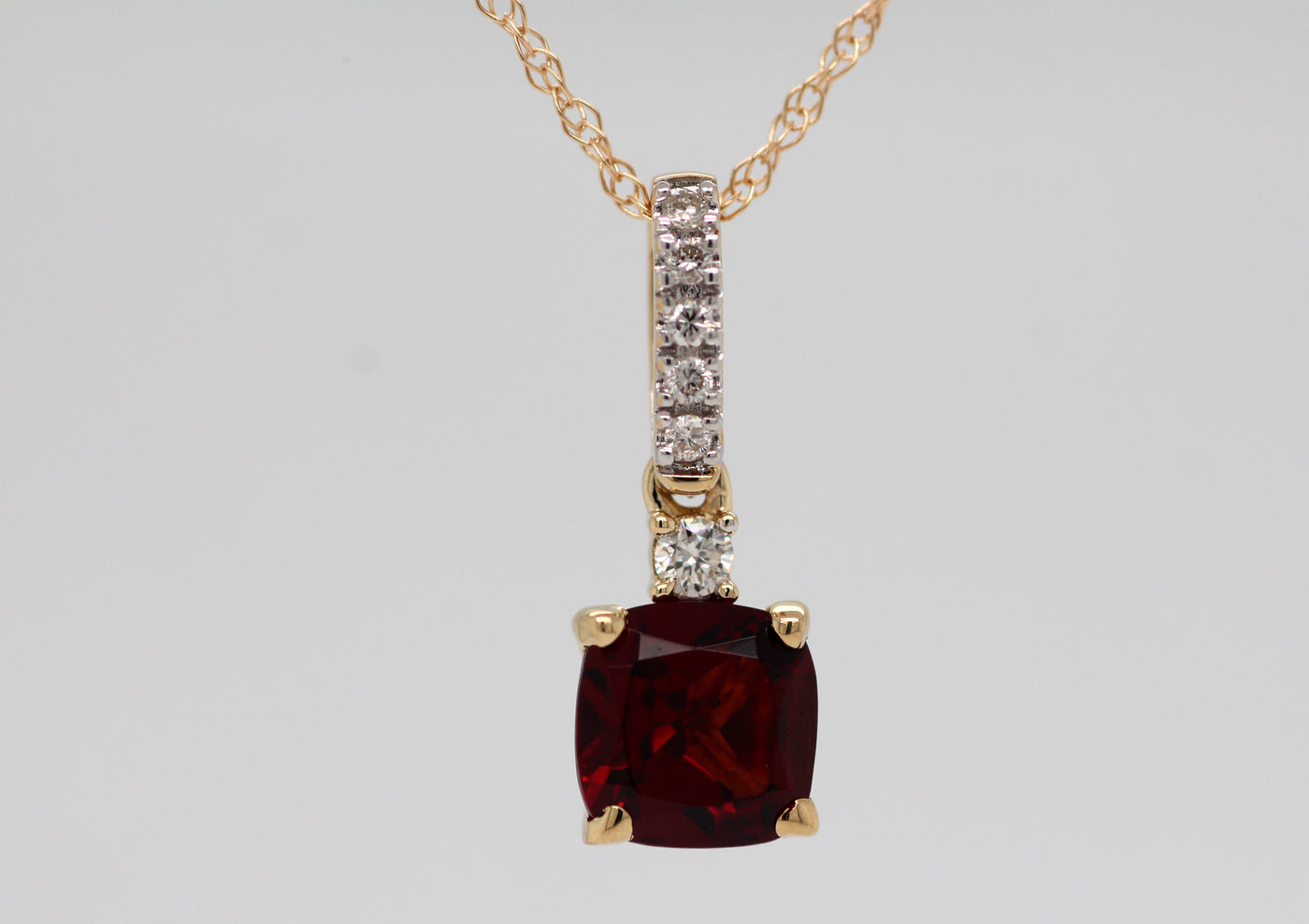 14KY 1.23 Ct Garnet and Diamond Pendant with .07 Cttw in Diamonds