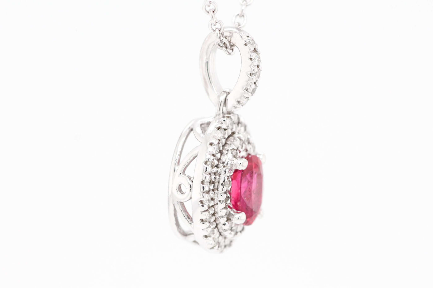 14KW .64 CT RUBY AND DIAMOND PENDANT, .20 CTTW, H-SI2