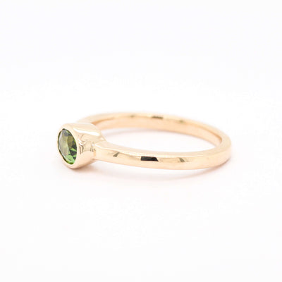 14KY .61 CT OVAL GREEN TOURMALINE RING image