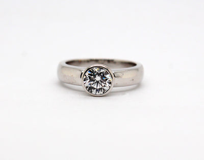 Platinum 1.01 Ct Round Brilliant Diamond Bezel Set Ring G in Color and
