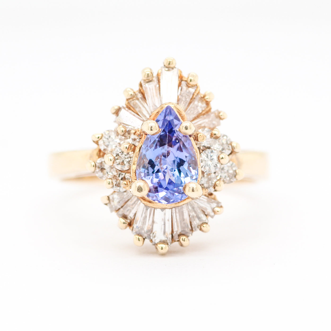 14KY .75 CT TANZANITE AND DIAMOND RING 1.05 CTTW