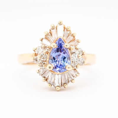 14KY .75 CT TANZANITE AND DIAMOND RING 1.05 CTTW