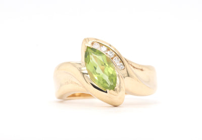 14KY Peridot and Diamond ring
