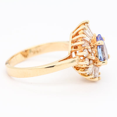 14KY .75 CT TANZANITE AND DIAMOND RING 1.05 CTTW