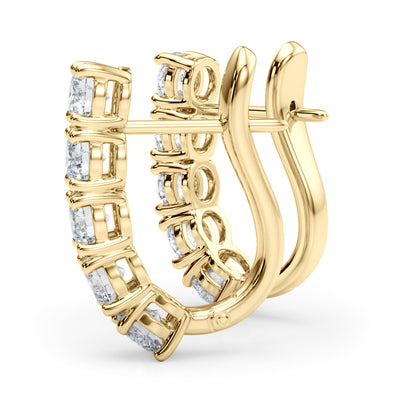 EARRINGS WITH OMEGA BACKS Complete per pair.