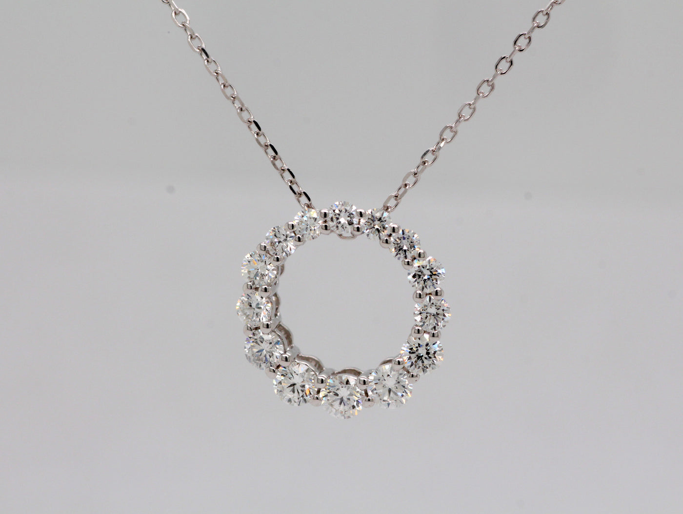 14KW .65 Cttw Diamond Circle Pendant