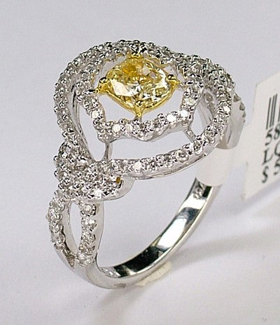 18KTT .64 Ct Fancy yellow Diamond and .66 Cttw Diamond Ring image