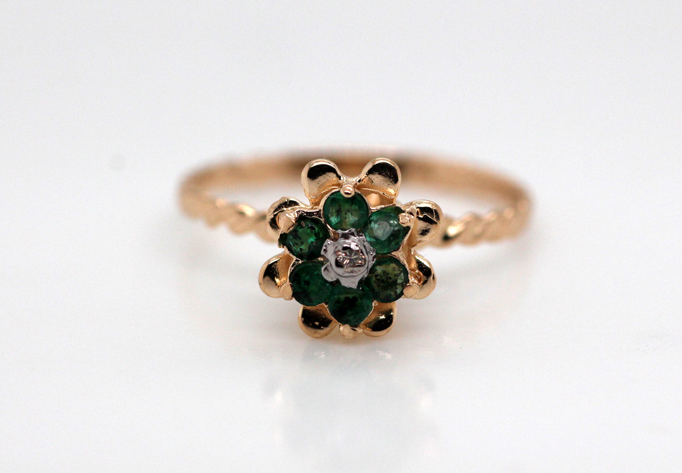 ESTATE 14KY .13 CTTW EMERALD AND DIAMOND TULIP RING .01 CTTW