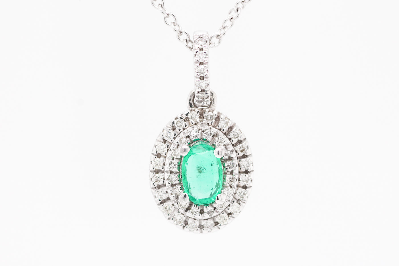 14KW .41 CT EMERALD AND DIAMOND PENDANT, .20 CTTW, H-SI2