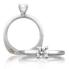 A JAFFE PLATINUM .04CTTW ENGAGEMENT RING