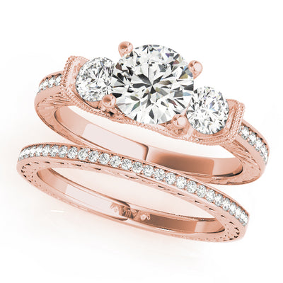 ENGAGEMENT RINGS 3 STONE ROUND
