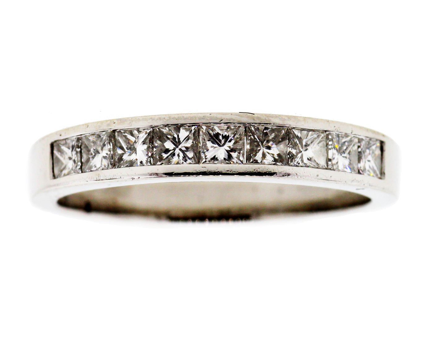 PLATINUM .56CTTW DIAMOND CHANNEL WEDDING RING