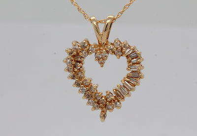 Estate 10KY .50 Cttw Diamond Heart Pendant