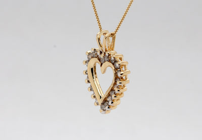 Estate 14KY .26 Cttw Diamond Heart Pendant