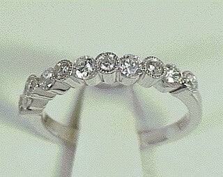 18KW .58 Cttw Diamond Ring