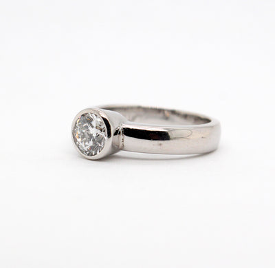 Platinum 1.01 Ct Round Brilliant Diamond Bezel Set Ring G in Color and