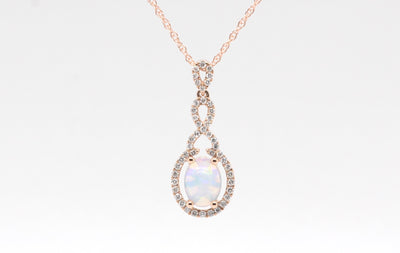 14KR .90 Ct Opal and Diamond Pendant