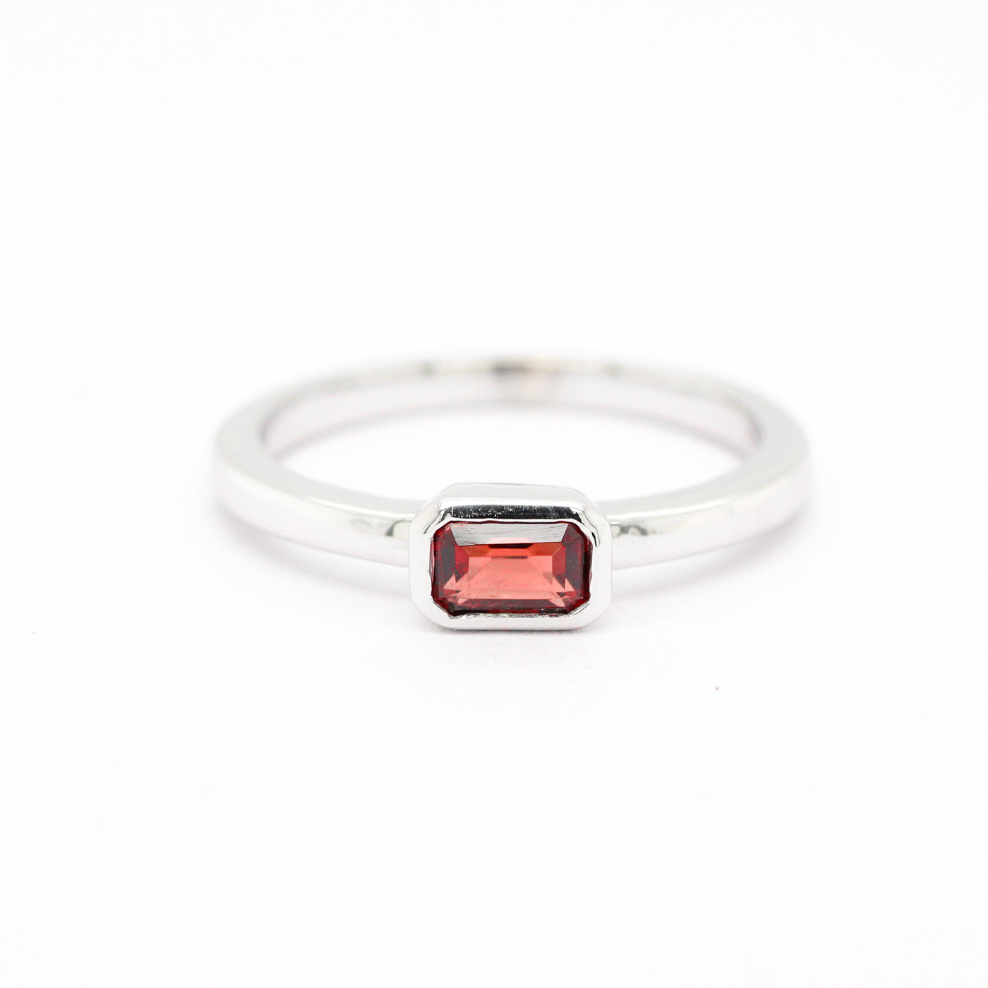 14KW .43 CT EMERALD CUT GARNET RING