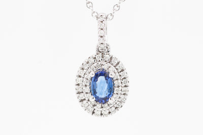 14KW .48 CT SAPPHIRE AND DIAMOND PENDANT, .20 CTTW, H-SI2