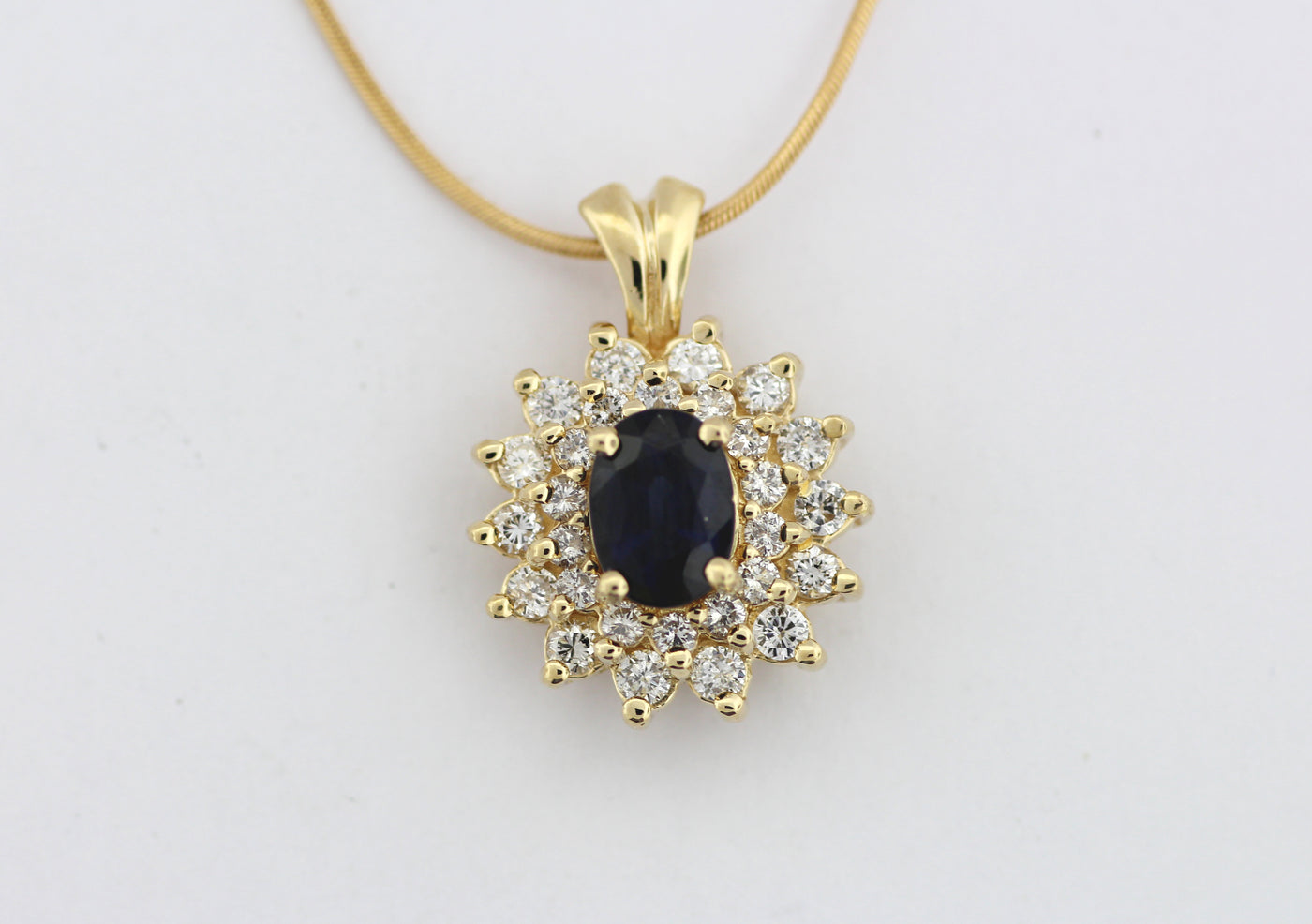 14KY 1.05 CT SAPPHIRE AND DIAMOND PENDANT .52 CTTW