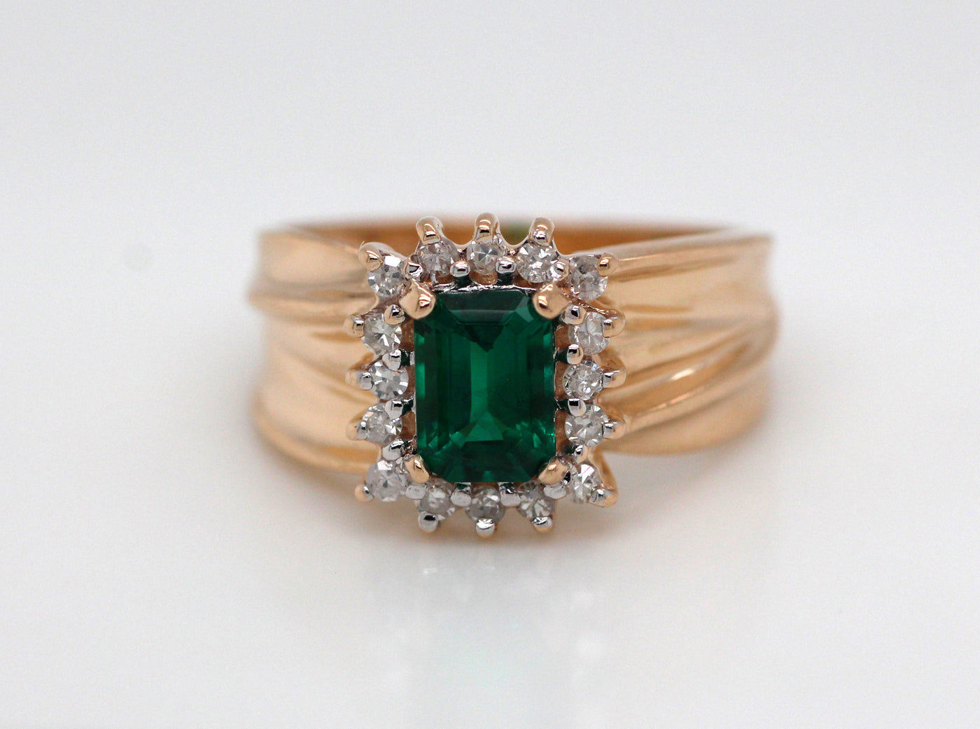 ESTATE 14KY .80 CT SYNTHETIC EMERALD AND DIAMOND RING .25 CTTW H-SI2