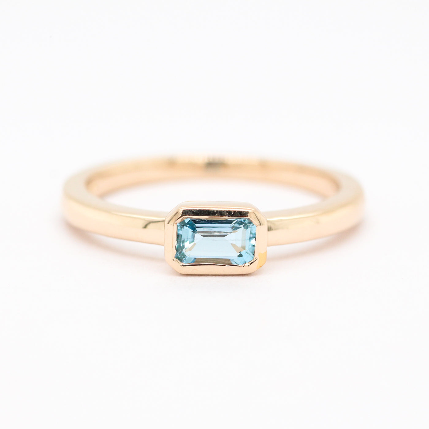 14KY .26 CT EMERALD CUT AQUAMARINE RING