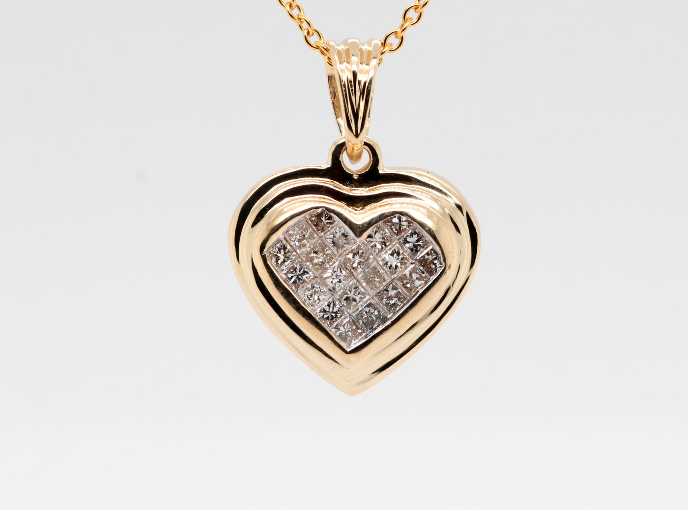 Estate 14KY .50 Cttw diamond puffed heart invisibly set pendant, H-SI2