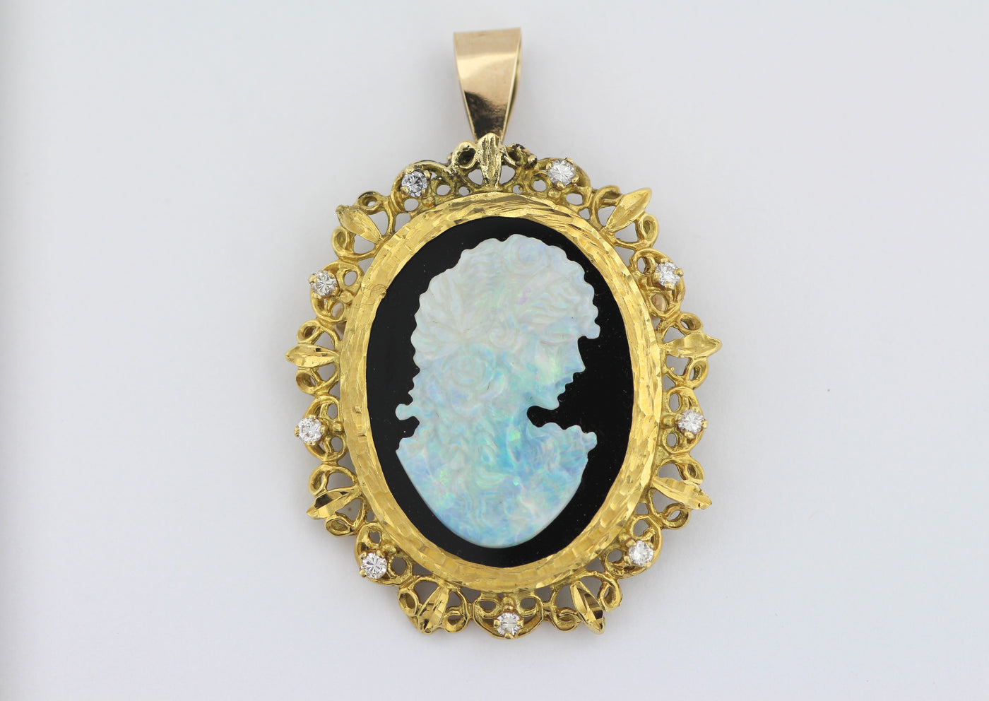 ESTATE 18KY OPAL AND BLACK ONYX DIAMOND CAMEO .45 CTTW