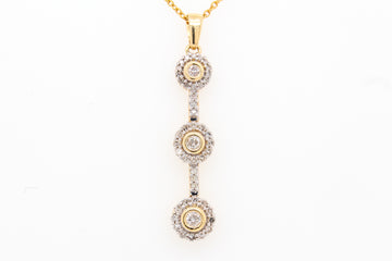 Estate 14ky .54 cttw diamond 3 stone style pendant, j-i1