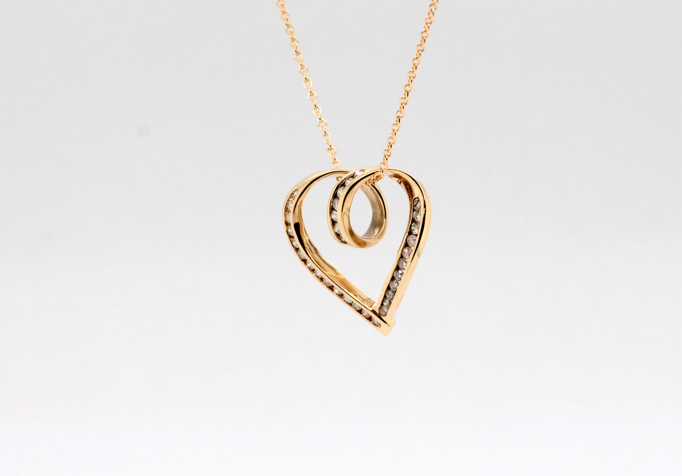 Estate 14KY .25 Cttw Diamond Heart Pendant