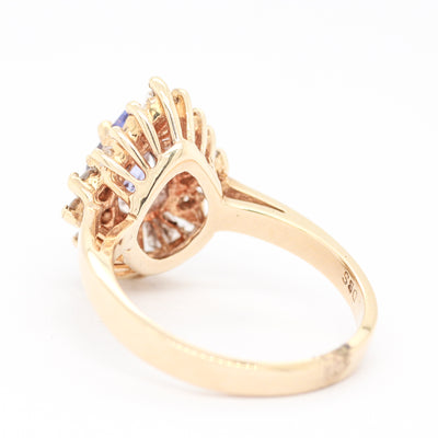 14KY .75 CT TANZANITE AND DIAMOND RING 1.05 CTTW