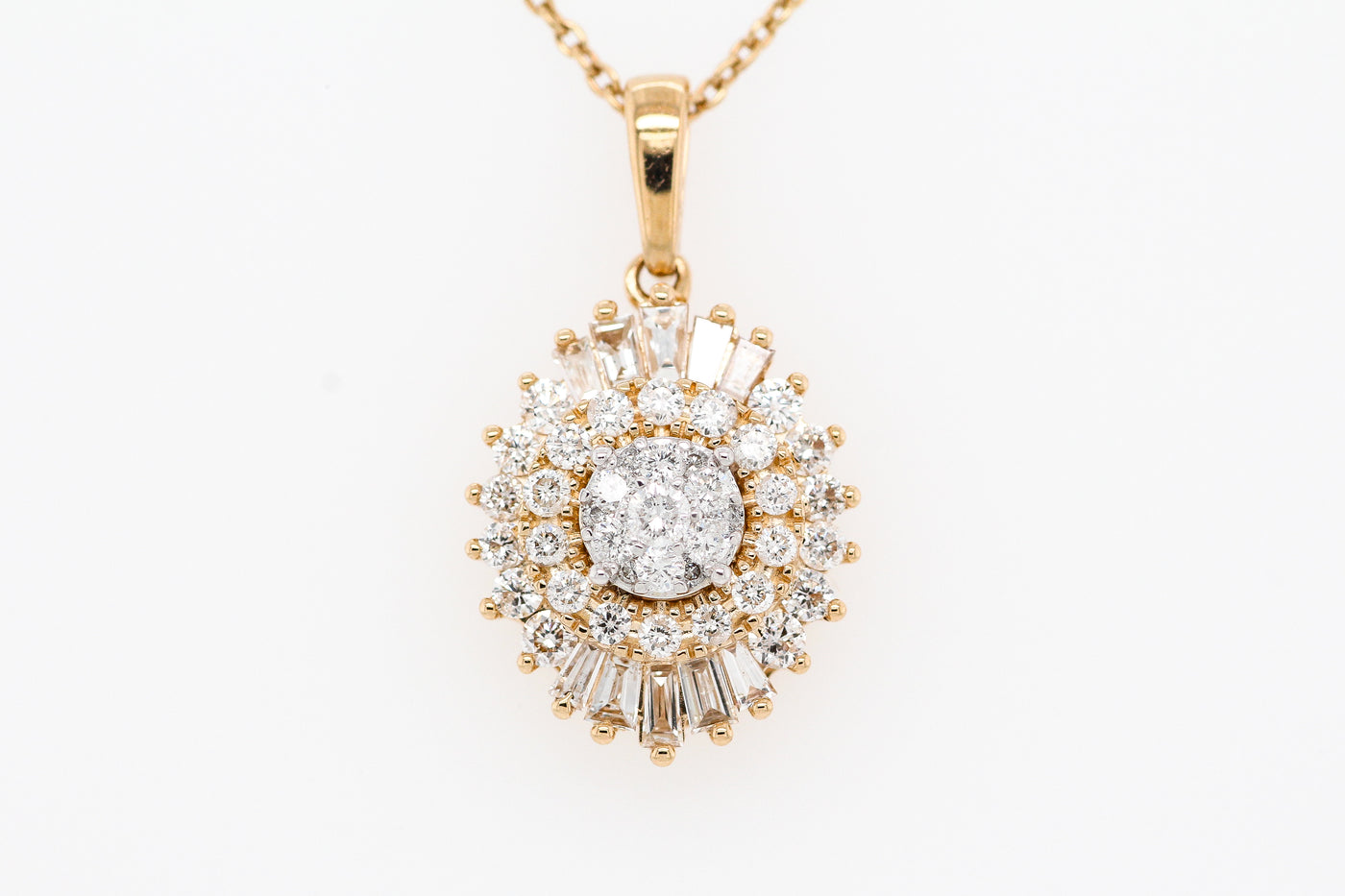14KY .63 CTW DIAMOND PENDANT, I-I1