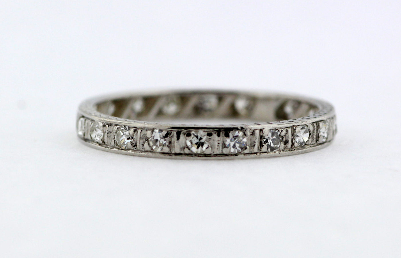 PLATINUM .20 CTTW DIAMOND ETERNITY BAND G-SI1