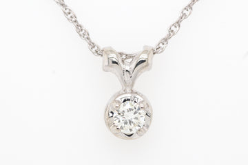 14kw .21 ct diamond solitaire pendant, i-si1